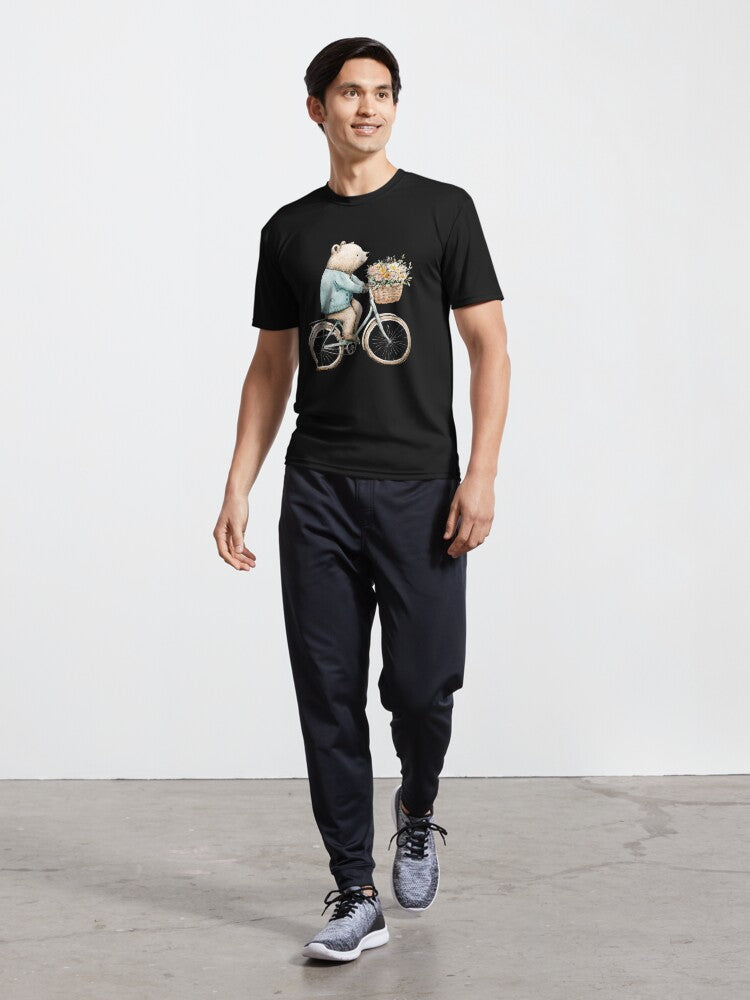 A white bear rides a bicycle with a bouquet of flowers. Active T-Shirt