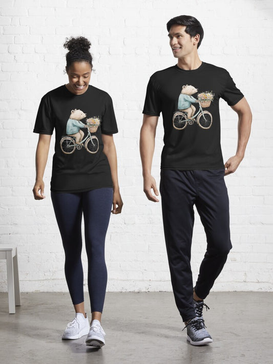 A white bear rides a bicycle with a bouquet of flowers. Active T-Shirt