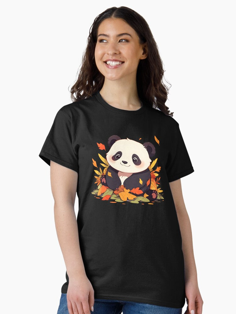A cute panda in a pile of autumn leaves Classic T-Shirt