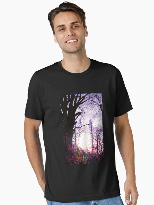 A sunset behind the ancient tree Essential T-Shirt