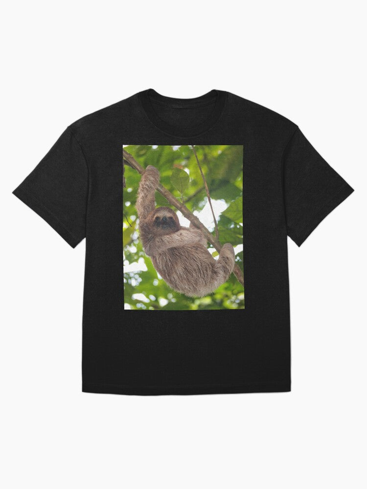 A young three-toed sloth animal in the jungle Oversized T-Shirt