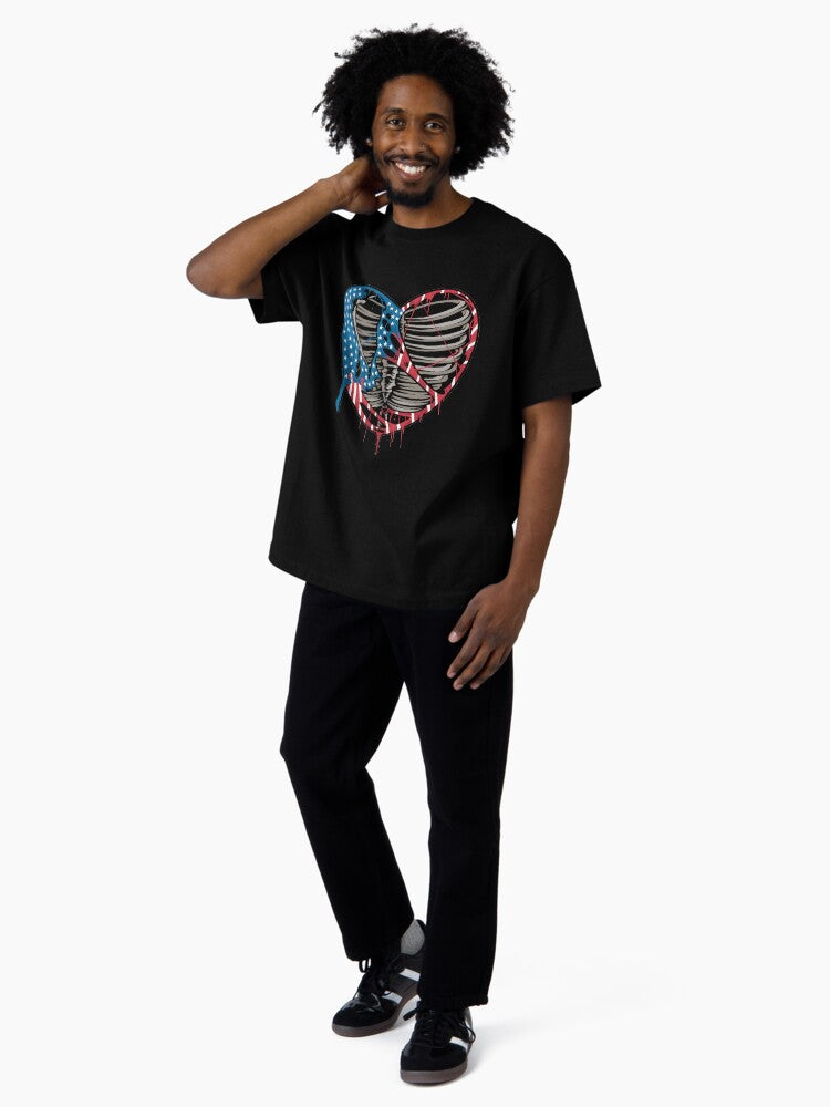 A torn heart with the colors of the united states flag Oversized T-Shirt