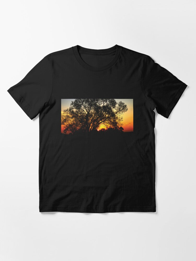 A glory sunrise behind a tree Essential T-Shirt